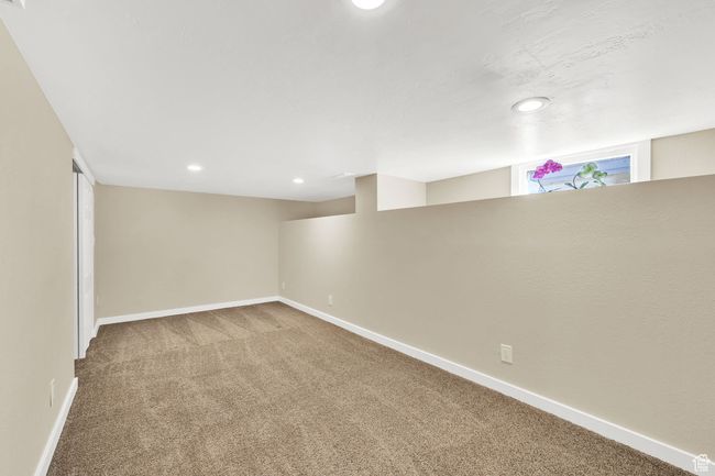 Basement with recessed lighting, carpet floors, and baseboards | Image 21