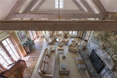 Upper overlooking into the formal LR, double height stone fireplace. Views to the Catskills | Image 2