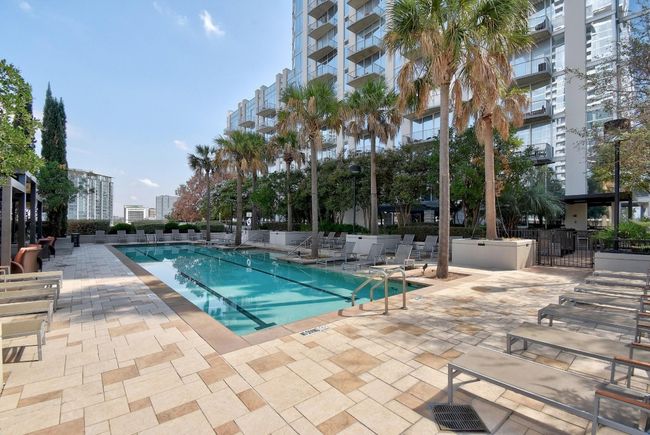 Community pool with a patio area | Image 18
