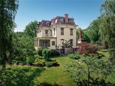 Rear view of property with a yard | Image 3