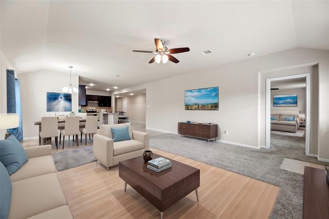 An open floorplan is fantastic for fostering a sense of togetherness and spaciousness in a home. It creates a fluidity between different areas, allowing for easy flow and communication between family members and guests. | Image 10
