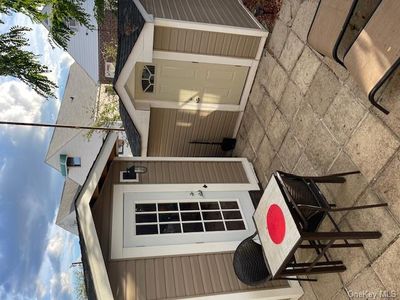 View of patio / terrace with a storage shed | Image 2