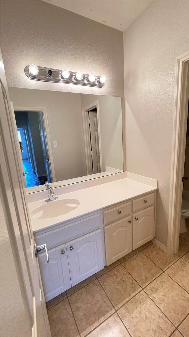 Bathroom featuring vanity and tile patterned floors | Image 27