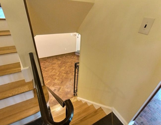 Staircase featuring baseboards | Image 22