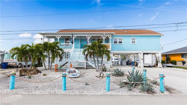 12277 Boat Shell Dr, House other with 3 bedrooms, 3 bathrooms and 3 parking in MATLACHA ISLES FL | Image 4