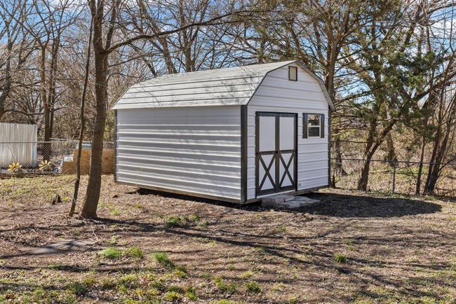 View of shed featuring fence | Image 6