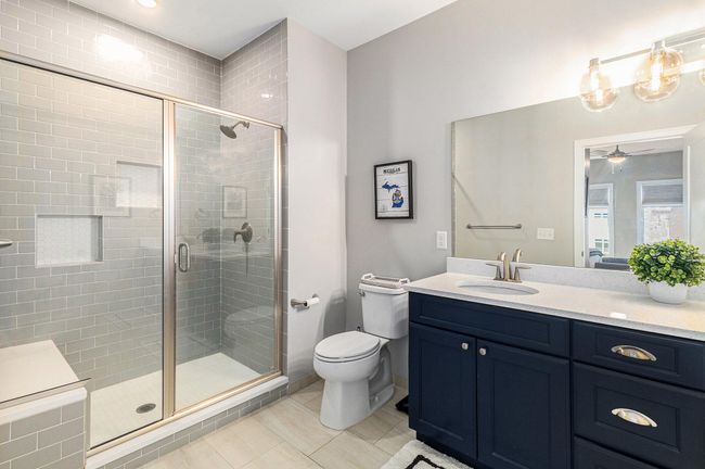 Primary Bath with tiled shower and bench | Image 26