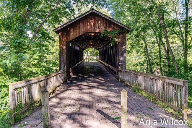 Charming covered bridge is perfect for walks and retreats! | Image 44