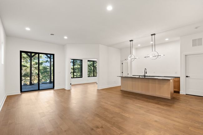 Daylight, walk-out basement with high ceilings, ample natural light and additional living space | Image 42