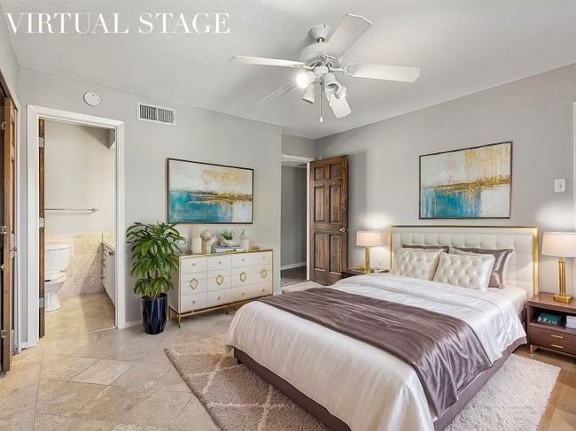 Bedroom featuring visible vents, connected bathroom, baseboards, a textured ceiling, and ceiling fan | Image 29