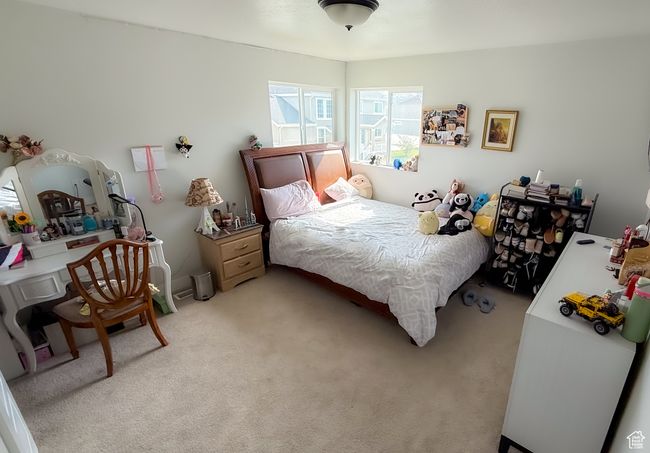 Bedroom with light colored carpet | Image 17