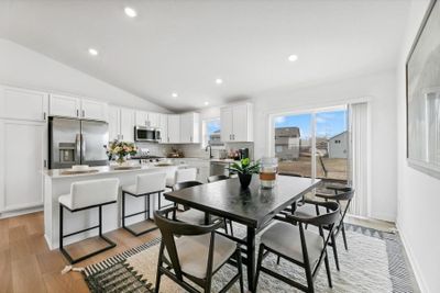 There is plenty of natural light in the kitchen and dining area. | Image 3