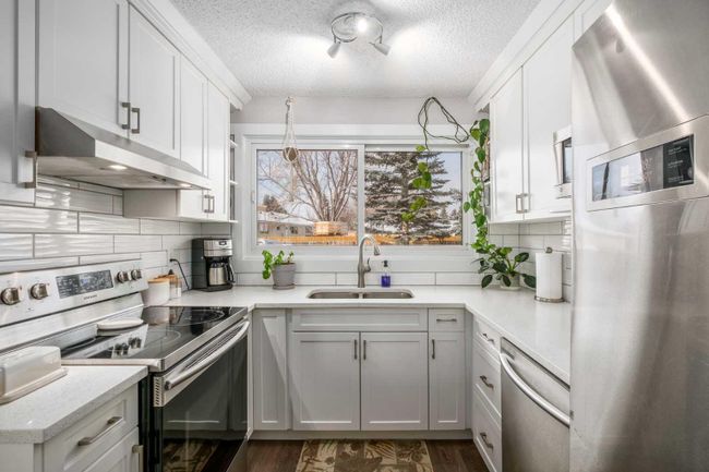 11468 Braniff Road Sw, Home with 4 bedrooms, 2 bathrooms and 4 parking in Calgary AB | Image 11