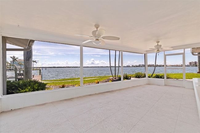 Covered and screened patio | Image 24