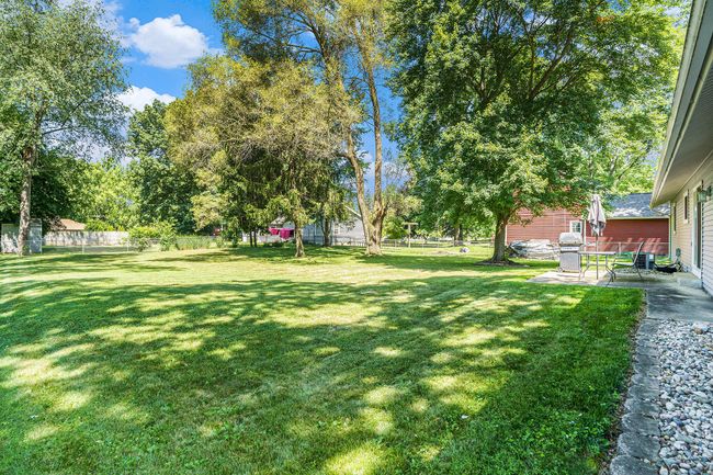 LARGE FENCED IN BACKYARD | Image 25