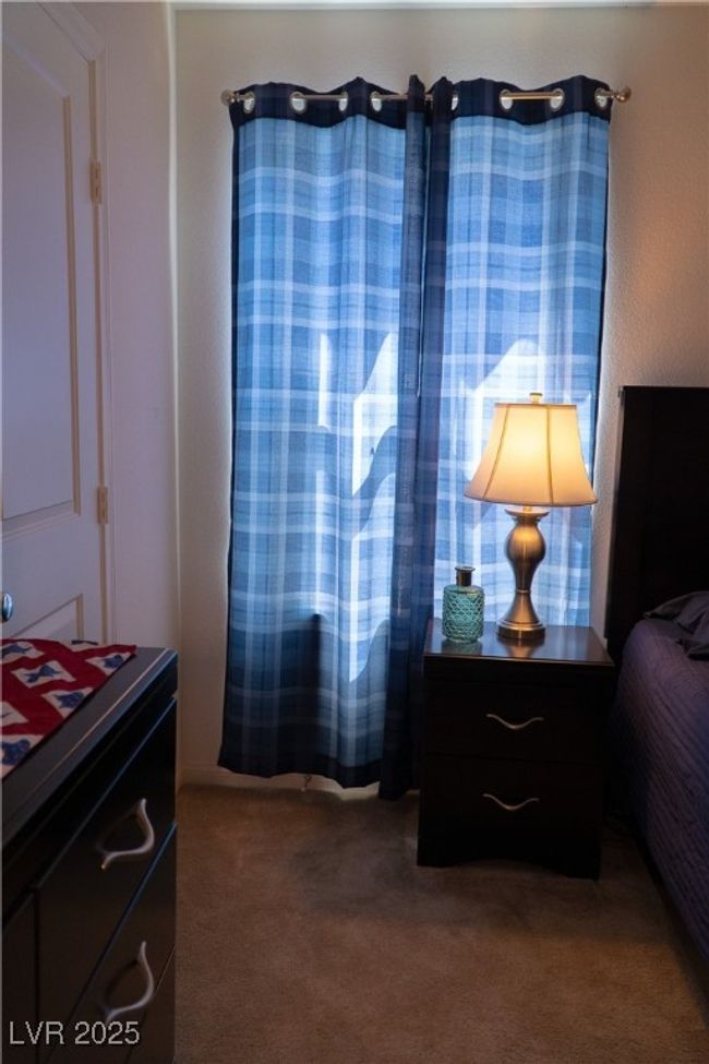 Bedroom featuring carpet | Image 54