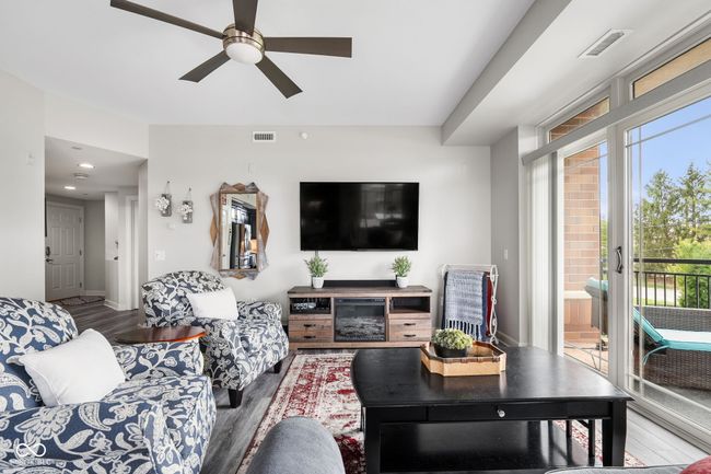 Cozy living area with access to one of two sliding glass doors | Image 11