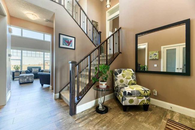 312 Boulder Creek Cres Se, House other with 3 bedrooms, 3 bathrooms and 6 parking in Langdon AB | Image 4