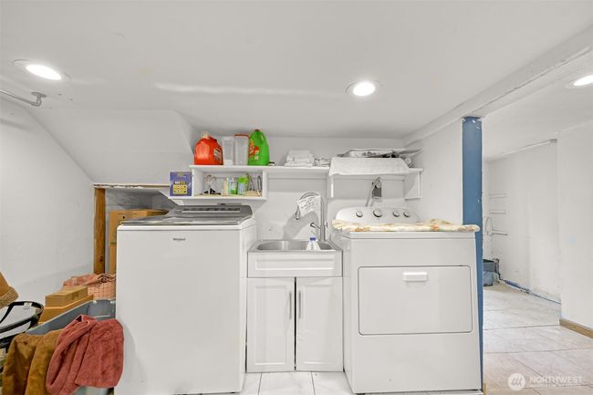 Laundry downstairs. | Image 20