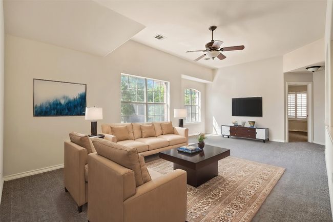 The upstairs includes a game room, three bedrooms, and two baths. *Virtually Staged* | Image 28