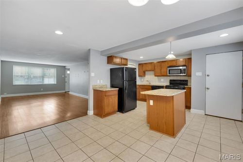 7731 Wild Plum Ave, University City, MO, 63130-2727 | Card Image