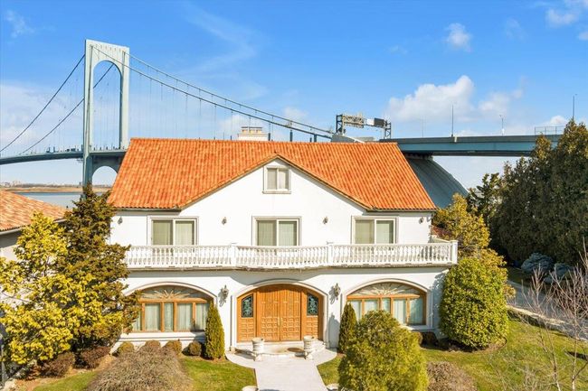 Back of house with a balcony and stucco siding | Image 29