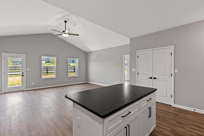 Living room/kitchen island and large pantry | Image 17