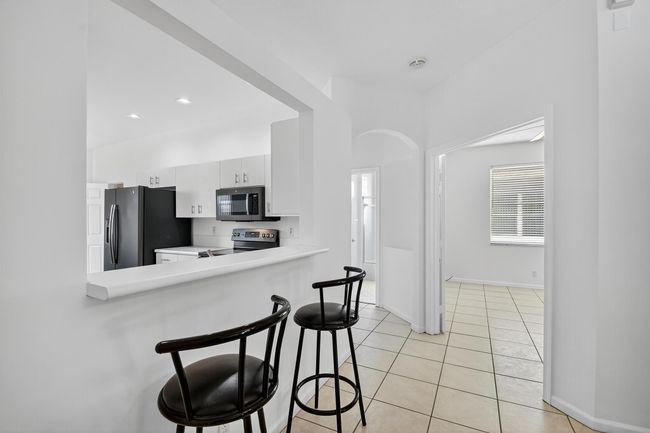 9675 Crescent View Dr N, Condo with 3 bedrooms, 2 bathrooms and null parking in Boynton Beach FL | Image 10