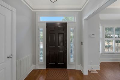 The entry foyer is a welcoming entrance to this nicely updated home | Image 3