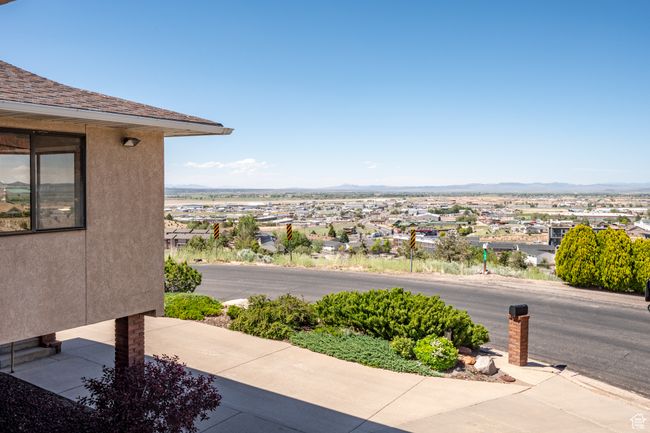 Water view featuring a mountainous background and nearby suburban area | Image 49