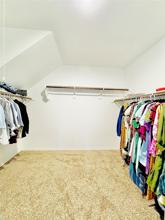 Spacious closet with carpet and vaulted ceiling | Image 28