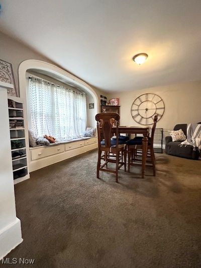 View of carpeted dining space | Image 3