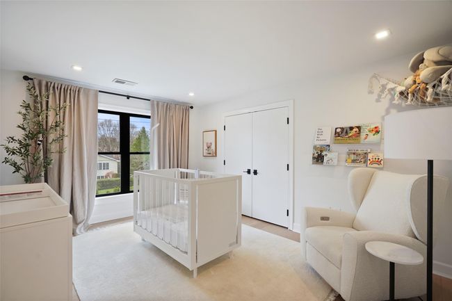 Bedroom featuring light wood-style floors | Image 22