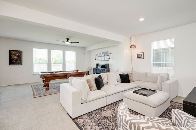 Living area featuring billiards table, healthy amount of natural light, recessed lighting, ceiling fan, and carpet flooring | Image 5