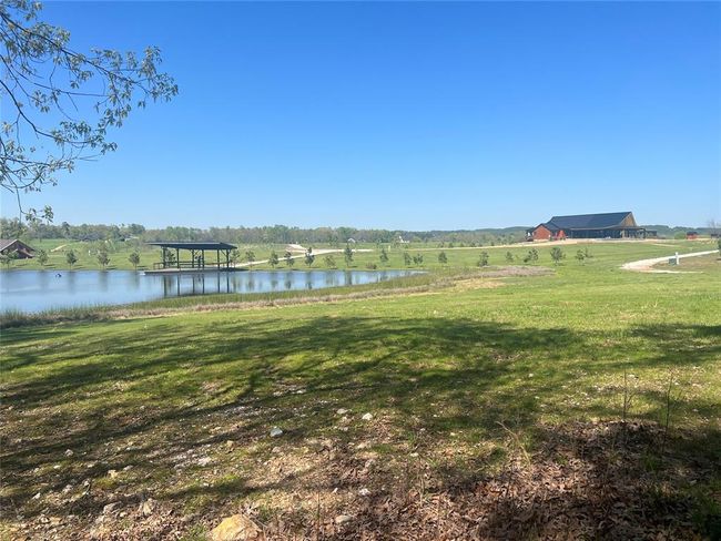 View of yard featuring a water view | Image 9