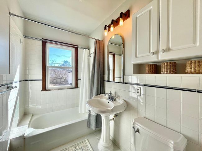 The main floor full bathroom with brand new window. | Image 11