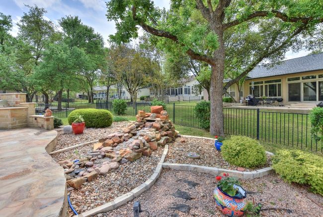 Enjoy the peaceful sound of the waterfall as you entertain or simply relax after a hard day of having fun. | Image 28
