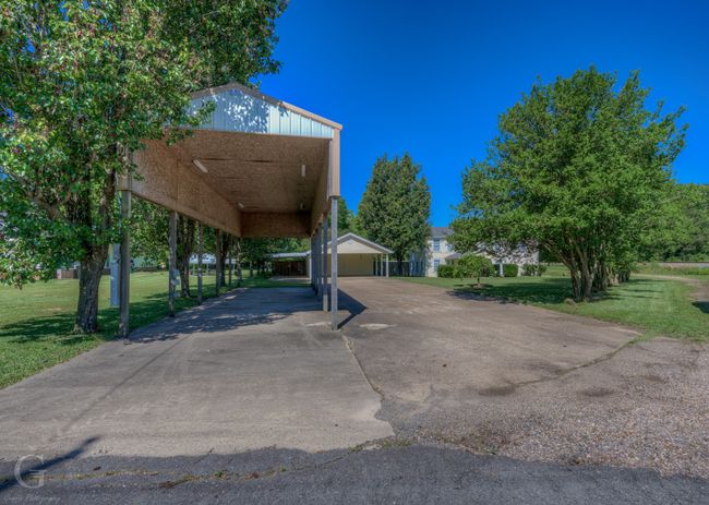 View of parking / parking lot with driveway | Image 6