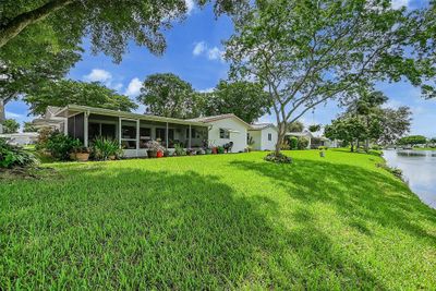 Screened in patio with a lakeview. | Image 2