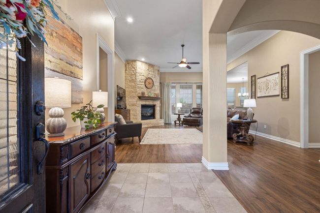 Tall ceilings, warm & inviting entrance. | Image 7