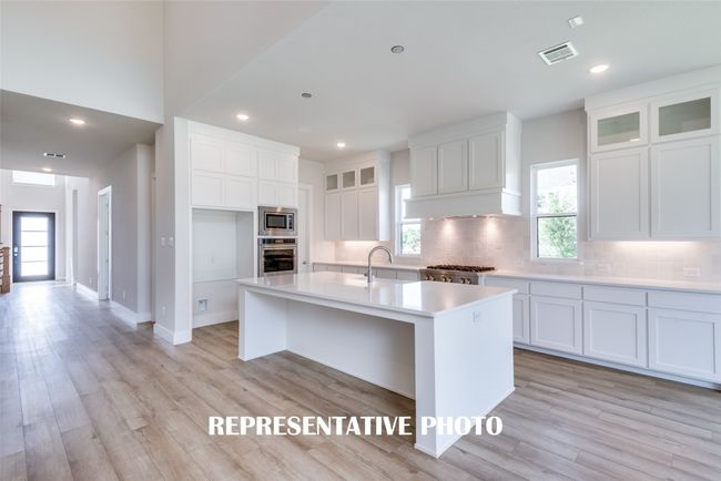 Style and sophistication abound in this dream kitchen! REPRESENTATIVE PHOTO. | Image 6