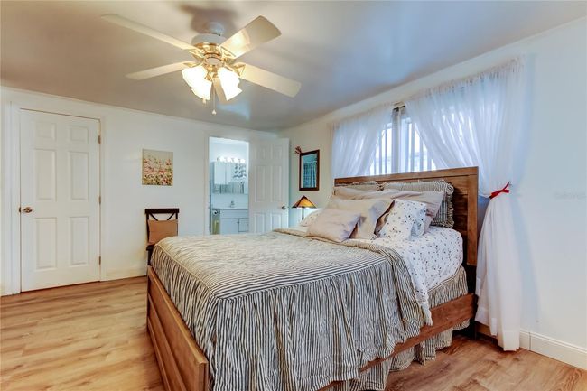 36. Owners Retreat (11.6' x 16.5') Vertical Blinds w Sheers, x2 Large Closets, Smart TV, & TEMPERPEDIC Mattress w Adjustable Frame!. | Image 35
