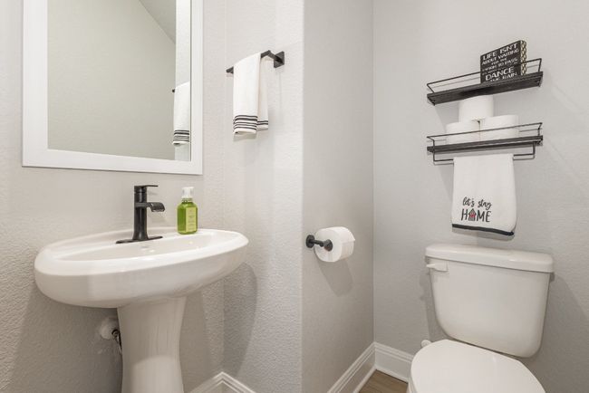 Half bath main floor for guests. | Image 10