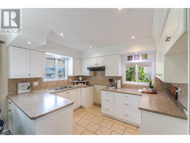13018 Armstrong Ave, House other with 4 bedrooms, 3 bathrooms and 4 parking in Summerland BC | Image 5
