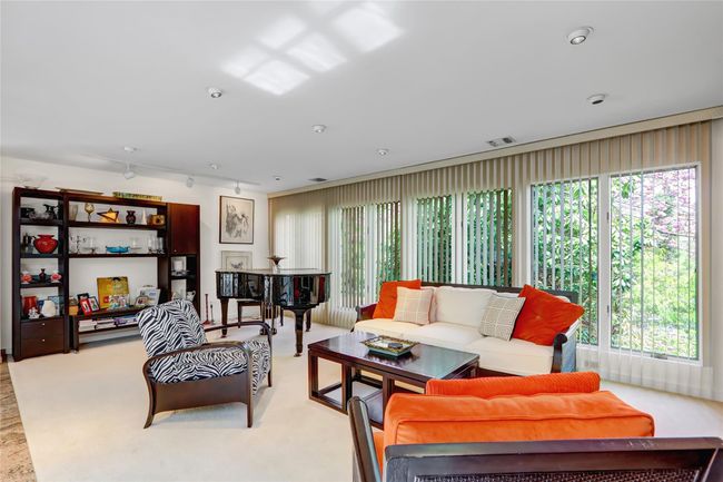 Living area with visible vents and a wealth of natural light | Image 12