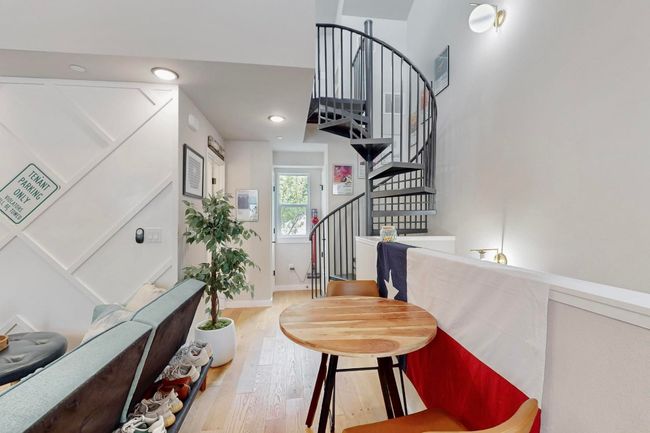 Foyer entrance with wood finished floors, stairway, baseboards, and recessed lighting | Image 11
