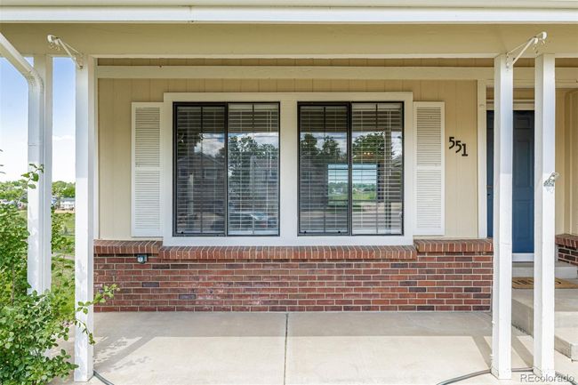 Covered front patio. | Image 4
