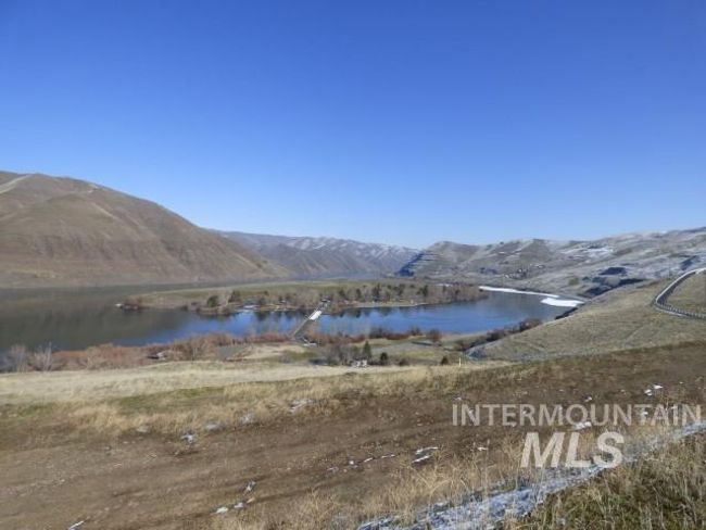 Mountain view with a large body of water | Image 43