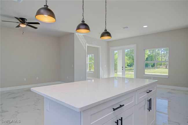 Kitchen with baseboards, marble finish floor, visible vents, and recessed lighting | Image 9