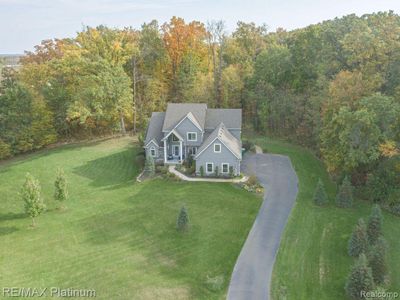 824 N Hacker Road, Home with 4 bedrooms, 2 bathrooms and null parking in Hartland Twp MI | Image 1